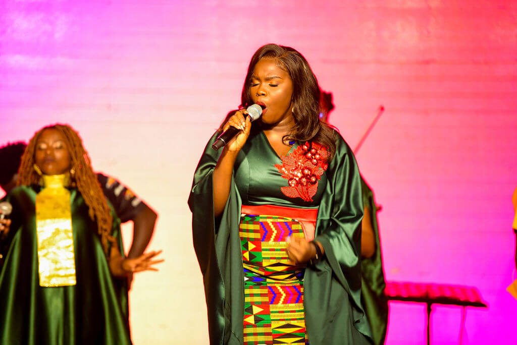 Purity Atieno at the stage performing