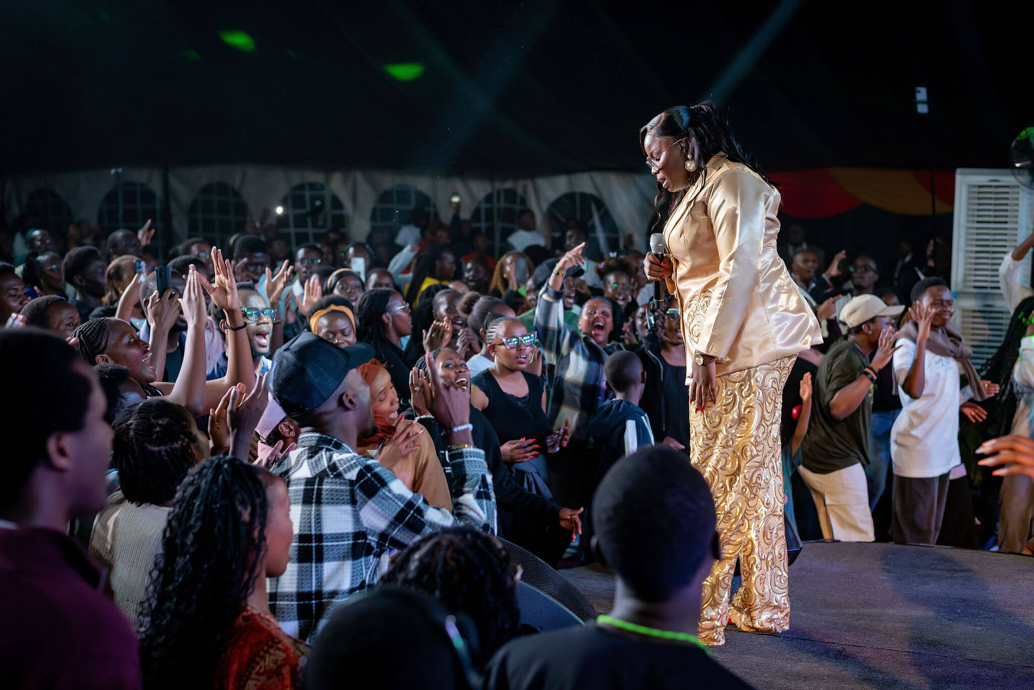 Purity Atieno at the  Ancient Call stage engaging with the audience