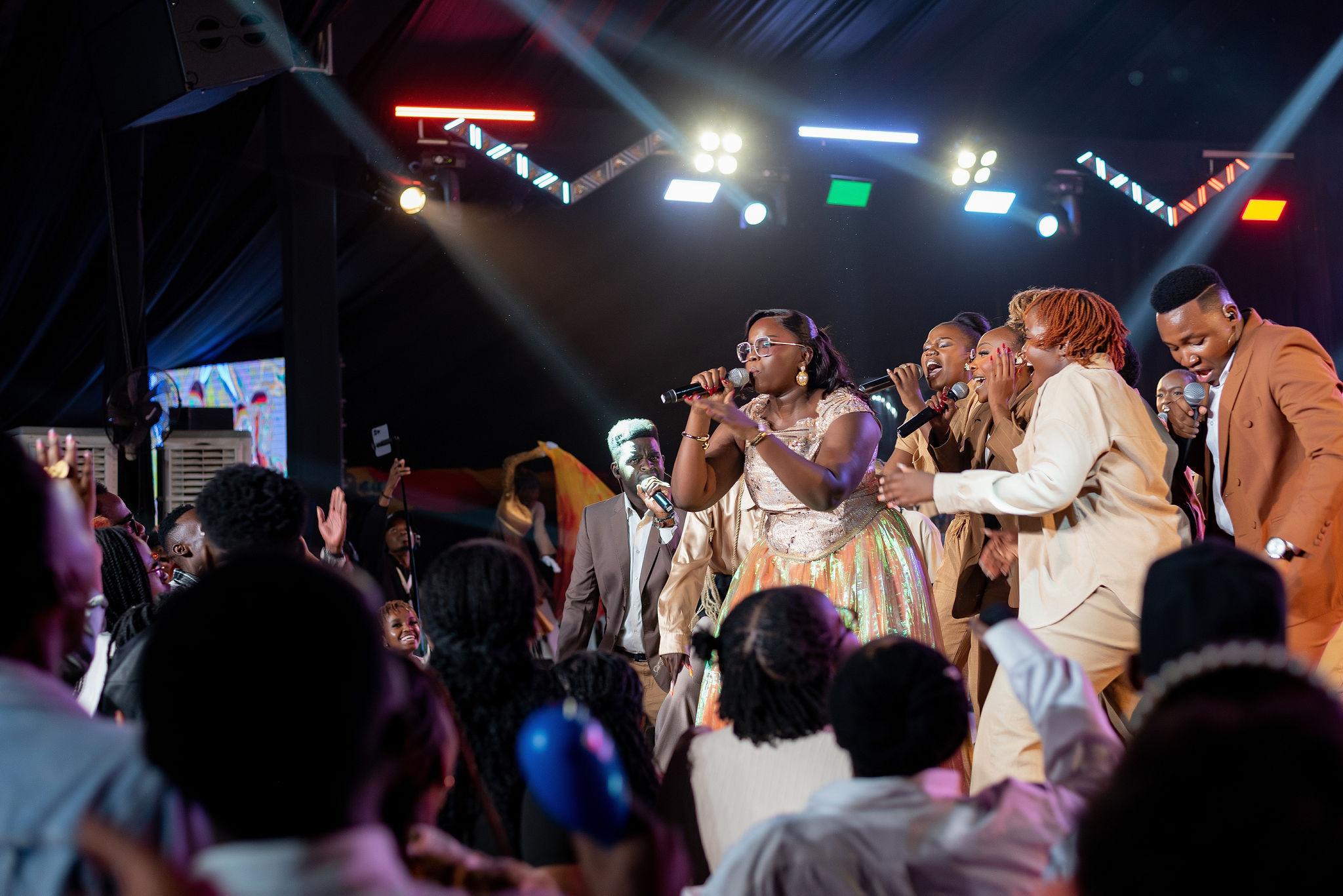 Purity Atieno on the stage during Arise